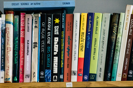 Tel Aviv Israel July 21, 2019 View of an ample selection of used Hebrew and English books in a warm, comfy space with a cafe and a patio located at The Little Prince bookshop in Tel Avivのeditorial素材