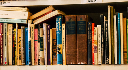 Tel Aviv Israel July 21, 2019 View of an ample selection of used Hebrew and English books in a warm, comfy space with a cafe and a patio located at The Little Prince bookshop in Tel Avivのeditorial素材