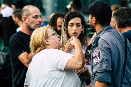 Tel Aviv Israel August 1, 2019 View of Israeli police at a political demonstration against the government of Benjamin Netanyahu in front of Azrieli Center in Tel Aviv in the early eveningのeditorial素材