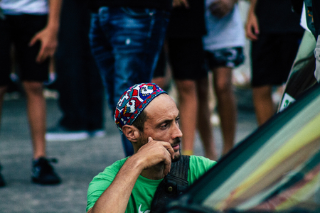 Tel Aviv Israel August 1, 2019 View of Israeli people taking part in a political demonstration against the government of Benjamin Netanyahu in front of Azrieli Center in Tel Aviv in the early eveningのeditorial素材