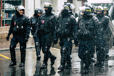 Paris France May 11, 2019 View of men of the French National Police walking in the streets of Paris...