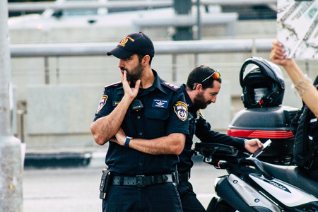Tel Aviv Israel August 1, 2019 View of Israeli police at a political demonstration against the government of Benjamin Netanyahu in front of Azrieli Center in Tel Aviv in the early eveningのeditorial素材
