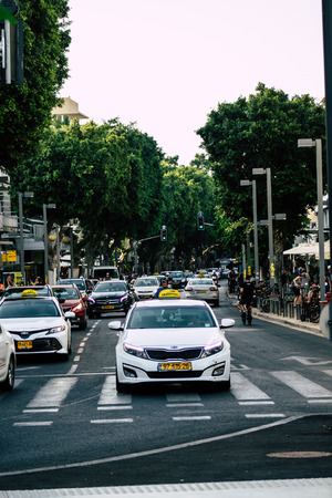 Tel Aviv Israel August 5, 2019 View of traditional Israeli taxi rolling in the streets of Tel Aviv in the afternoonのeditorial素材