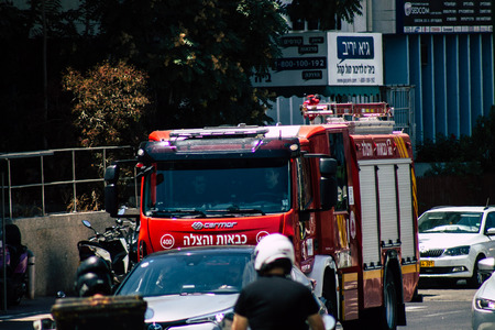 Tel Aviv Israel August 17, 2019 View of traditional Israeli fire engine rolling in the streets of Tel Aviv in the afternoonのeditorial素材
