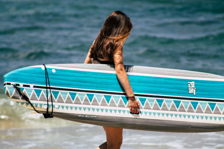 Tel Aviv Israel July 15, 2019 View of unknown Israeli people practicing surfing on Tel Aviv beach in...