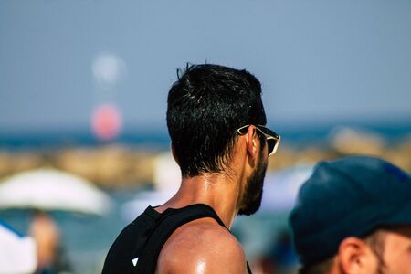 Tel Aviv Israel August 24, 2019 View of unknown Israeli people playing beach volley on the public beach of Tel Aviv in the morningの写真素材