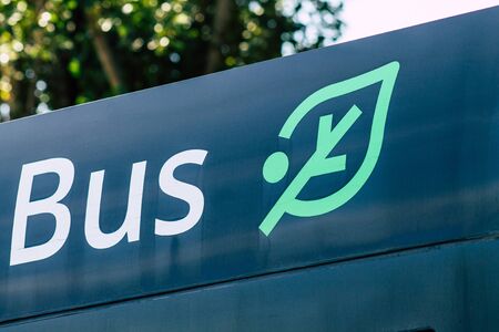 Rome Italy September 15, 2019 View of blue public buses parked at the bus stand in Rome in the morningの写真素材