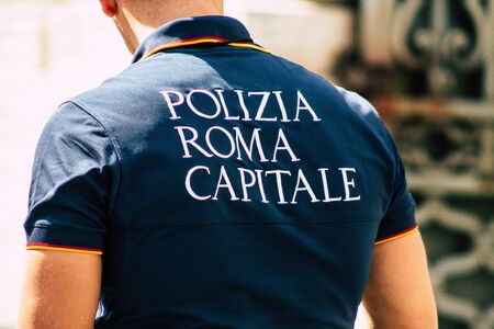 Rome Italy September 15, 2019 View of a Italian police officer walking in the streets of Rome in the morningの写真素材