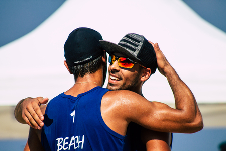 Tel Aviv Israel August 24, 2019 View of unknown Israeli people playing beach volley on the public beach of Tel Aviv in the morningのeditorial素材