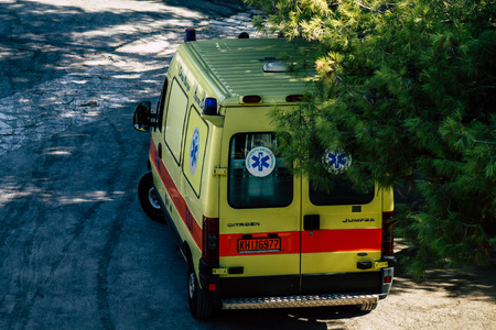 Athens Greece September 4, 2019 View of a Greek ambulance driving through the streets of Athens in the morningのeditorial素材