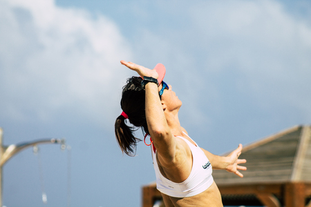 Tel Aviv Israel August 24, 2019 Portrait of unknown Israeli girl playing beach volley on the public beach of Tel Aviv in the morningのeditorial素材
