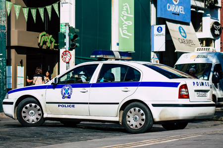Athens Greece September 12, 2019 View of a Greek police car driving through the streets of Athens in the eveningのeditorial素材