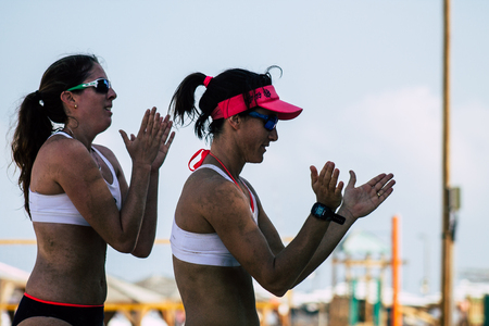 Tel Aviv Israel August 24, 2019 Portrait of unknown Israeli girl playing beach volley on the public beach of Tel Aviv in the morningのeditorial素材