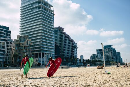 Tel Aviv Israel September 18, 2019 View of unknown Israeli people having fun on the beach of Tel Aviv during a sunny day in the afternoonの写真素材