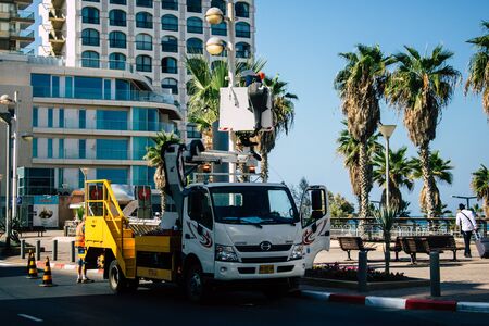 Tel Aviv Israel September 19, 2019 View of technicians from the electricity company working in the streets of Tel Aviv in the afternoonの写真素材