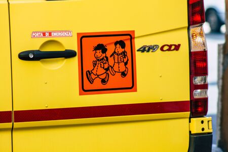 Rome Italy September 23, 2019 Closeup of a school bus driving through the streets of Rome in the afternoonの写真素材
