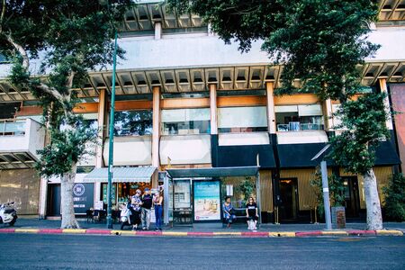 Tel Aviv Israel September 27, 2019 View of unknowns Israeli people at the bus stand in the streets of Tel Aviv in the afternoonの写真素材
