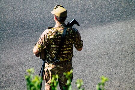 Rome Italy September 29, 2019 View of an Italian soldier on protection mission of the Coliseum of Rome in the morningの写真素材