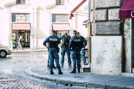 Rome Italy October 18, 2019 View of Italian police officer walking in the streets of Rome in the morningの写真素材