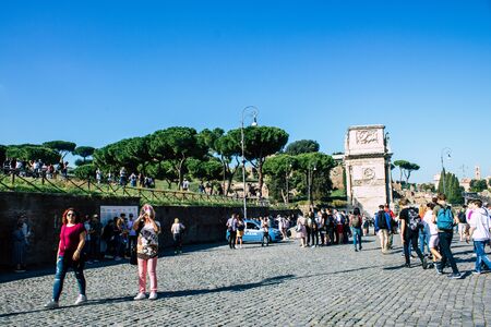 Rome Italy October 18, 2019 View of unknowns people walking in the streets of Rome near the Coliseum in the afternoonの写真素材