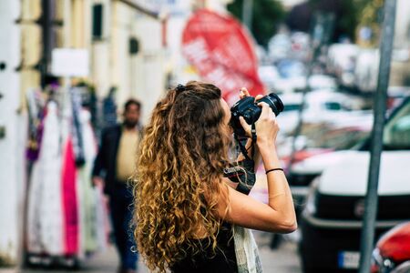 Rome Italy October 18, 2019 View of unknowns people walking in the streets of Rome near Vatican city in the afternoonの写真素材