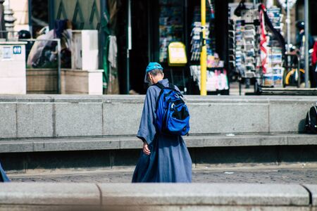 Rome Italy October 18, 2019 View of unknowns people walking in the streets of Rome near Vatican city in the afternoonの写真素材