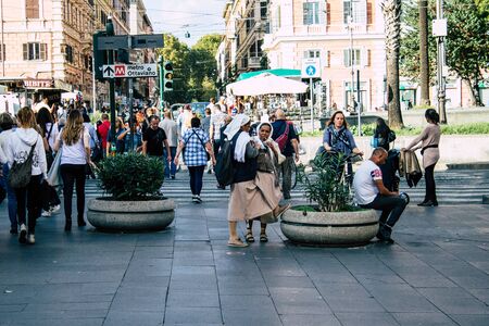 Rome Italy October 18, 2019 View of unknowns people walking in the streets of Rome near Vatican city in the afternoonの写真素材