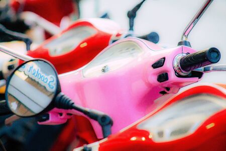 Rome Italy September 29, 2019 View of a traditional Italian Vespa parked in the streets of Rome in the morningの写真素材