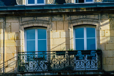 Reims France October 26, 2019 View of windows of a building in the street of Reims in the afternoon