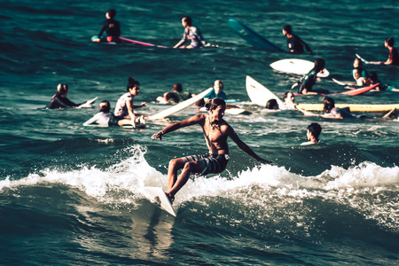 Tel Aviv Israel October 07, 2019 View of unknown Israeli people practicing surfing on Tel Aviv beach in the morningのeditorial素材