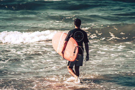 Tel Aviv Israel October 07, 2019 View of unknown Israeli people practicing surfing on Tel Aviv beach...