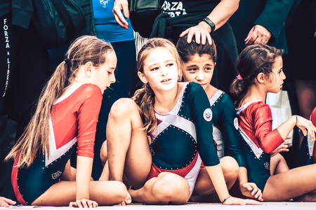 Rome Italy September 29, 2019 Celebrations of the 150th anniversary of the Italian gymnastics federation, public demonstration of young gymnasts in the streets of Rome near the Coliseumのeditorial素材