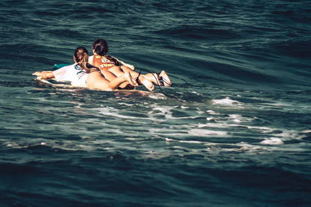 Tel Aviv Israel October 07, 2019 View of unknown Israeli people practicing surfing on Tel Aviv beach in the morningのeditorial素材
