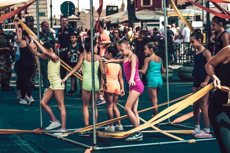 Rome Italy September 29, 2019 Celebrations of the 150th anniversary of the Italian gymnastics federation, public demonstration of young gymnasts in the streets of Rome near the Coliseumのeditorial素材