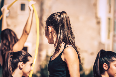 Rome Italy September 29, 2019 Celebrations of the 150th anniversary of the Italian gymnastics federation, public demonstration of young gymnasts in the streets of Rome near the Coliseumのeditorial素材
