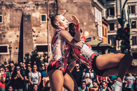 Rome Italy September 29, 2019 Celebrations of the 150th anniversary of the Italian gymnastics federation, public demonstration of young gymnasts in the streets of Rome near the Coliseumのeditorial素材