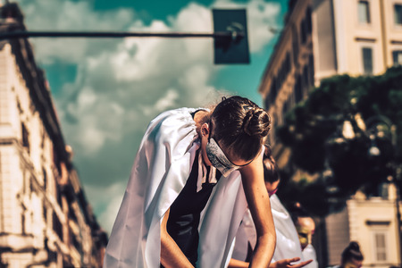 Rome Italy September 29, 2019 Celebrations of the 150th anniversary of the Italian gymnastics federation, public demonstration of young gymnasts in the streets of Rome near the Coliseumのeditorial素材