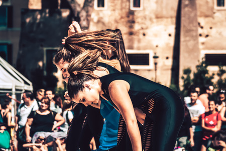 Rome Italy September 29, 2019 Celebrations of the 150th anniversary of the Italian gymnastics federation, public demonstration of young gymnasts in the streets of Rome near the Coliseumのeditorial素材
