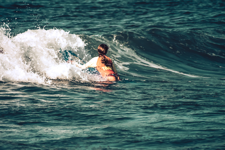 Tel Aviv Israel October 07, 2019 View of unknown Israeli people practicing surfing on Tel Aviv beach in the morningのeditorial素材