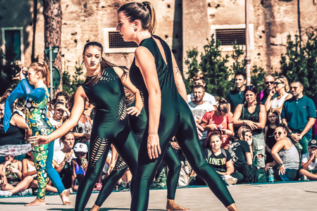 Rome Italy September 29, 2019 Celebrations of the 150th anniversary of the Italian gymnastics federation, public demonstration of young gymnasts in the streets of Rome near the Coliseumのeditorial素材
