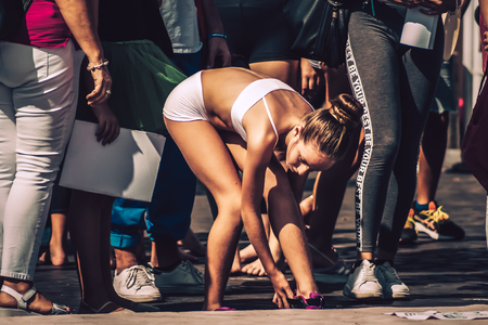 Rome Italy September 29, 2019 Celebrations of the 150th anniversary of the Italian gymnastics federation, public demonstration of young gymnasts in the streets of Rome near the Coliseumのeditorial素材