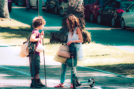 Tel Aviv Israel October 08, 2019 View of unknown Israeli people rolling with an electric scooter in the streets of Tel Aviv in the afternoonのeditorial素材