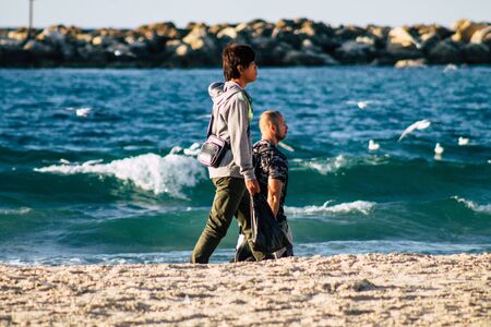 Tel Aviv Israel December 04, 2019 View of unknown people having fun on the beach of Tel Aviv in the...
