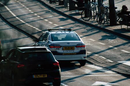 Tel Aviv Israel December 08, 2019 View of a Israeli police car rolling in the street of Tel Aviv in the afternoonの写真素材