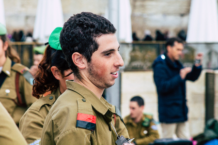 Jerusalem Israel December 11, 2019 View of Israeli soldiers participating in a military ceremony front the Western Wall of the old city of Jerusalem on the eveningのeditorial素材