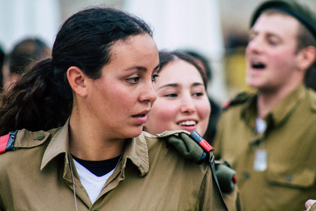 Jerusalem Israel December 11, 2019 View of Israeli soldiers having fun front the Western Wall of the old city of Jerusalem on the eveningのeditorial素材