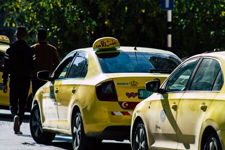Palestinian Territory Bethlehem December 16, 2019 View of yellow Palestinian taxi rolling in the streets of Bethlehem in the afternoonの写真素材