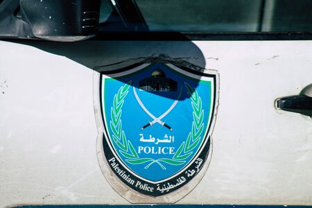Palestinian Territory Bethlehem December 16, 2019 Closeup of a Palestinian police car parked in the street of Bethlehem in the afternoonの写真素材