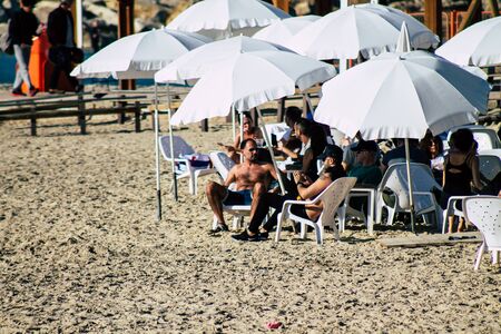 Tel Aviv Israel December 22, 2019 View of unidentified people having fun on the beach of Tel Aviv in the afternoonの写真素材