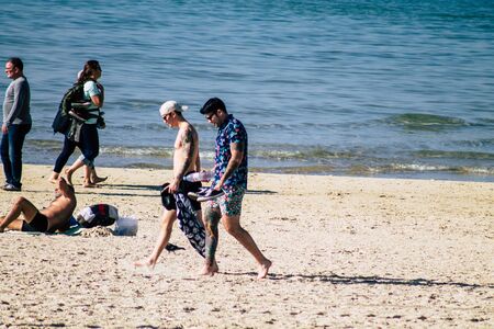 Tel Aviv Israel December 22, 2019 View of unidentified people having fun on the beach of Tel Aviv in the afternoonの写真素材